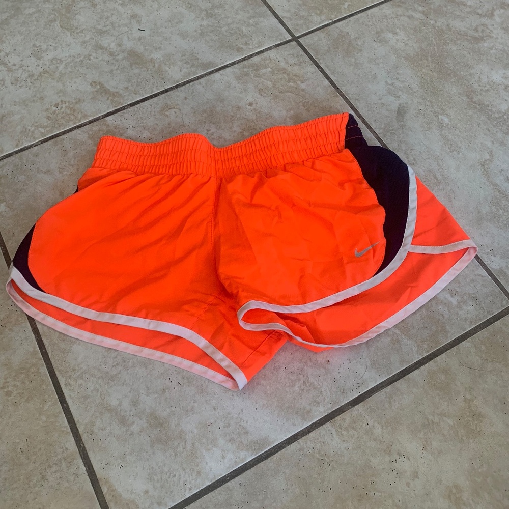 orange nike shorts